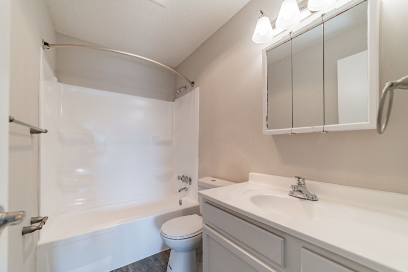 Bathroom with tub and updated vanity at The Ridges