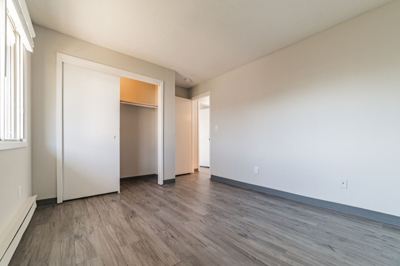 Bedroom with double closet at The Ridges