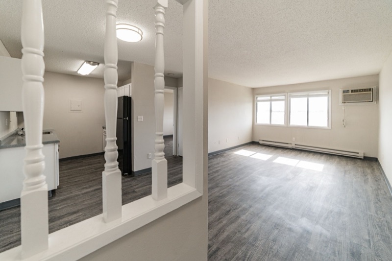 Living and dining area with decorative pillars at The Ridges